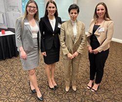 Marie Henein, a presenter at the event, poses with OBA PD lawyer Carly Deboni and program co-chairs Lindsay Charles and Katie Di Tomaso