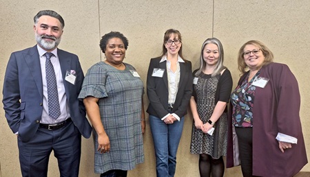 Members of the Citizenship and Immigration Law Section Executive pose for a group photo at the Town Hall event