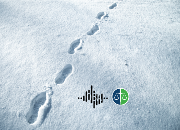 Image of footsteps in the snow leading into the distance, accompanied by two logos near the bottom of the image.