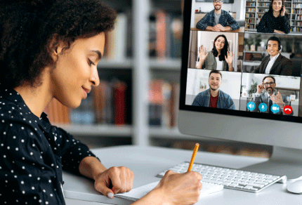 Legal professional participating in a virtual meeting from her office