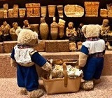 DALL-E Demo: An output generated by the input, “teddy bears shopping for groceries in ancient Egypt.”